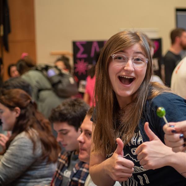 Student giving thumbs up at the Involvement Fair